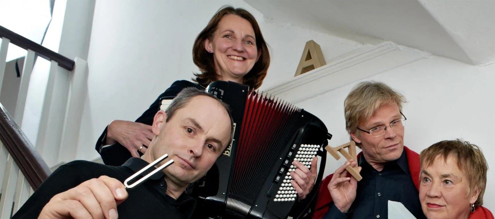 Foto Grimm-Quartett mit großem Buchstaben A